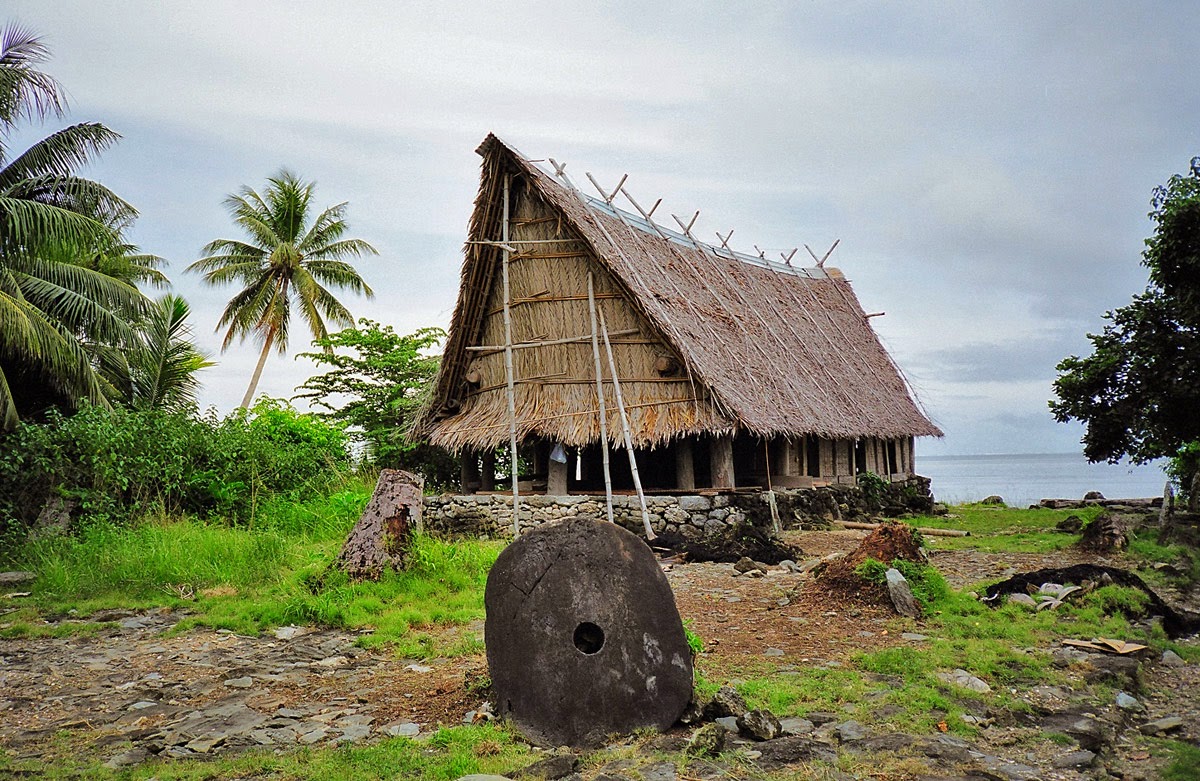 Yap stone in front of house