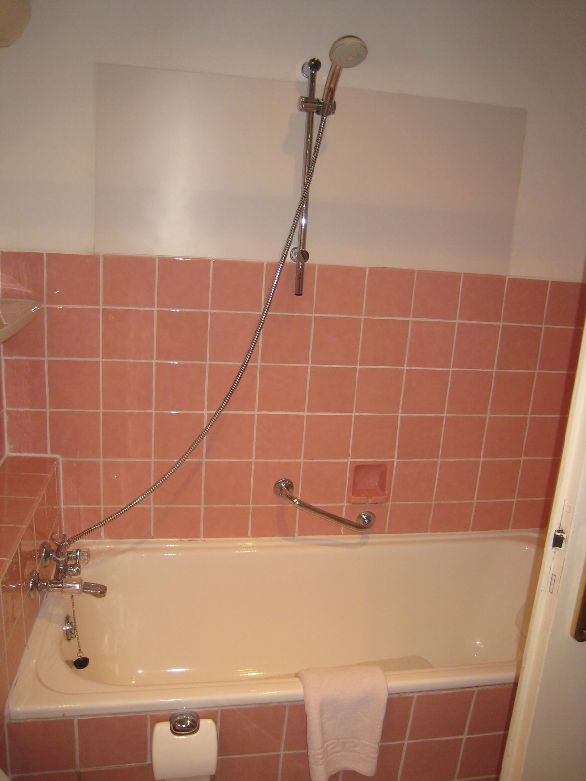 No shower curtain
